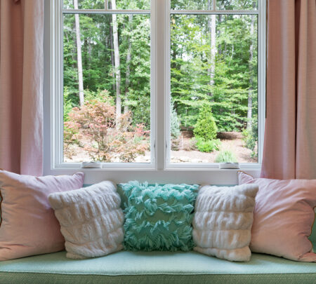 window with seating and cushions