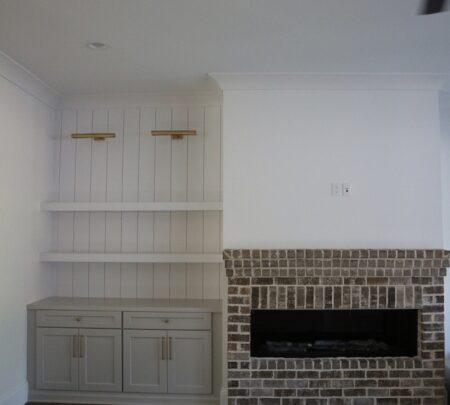 living room built-in shelving and fireplace